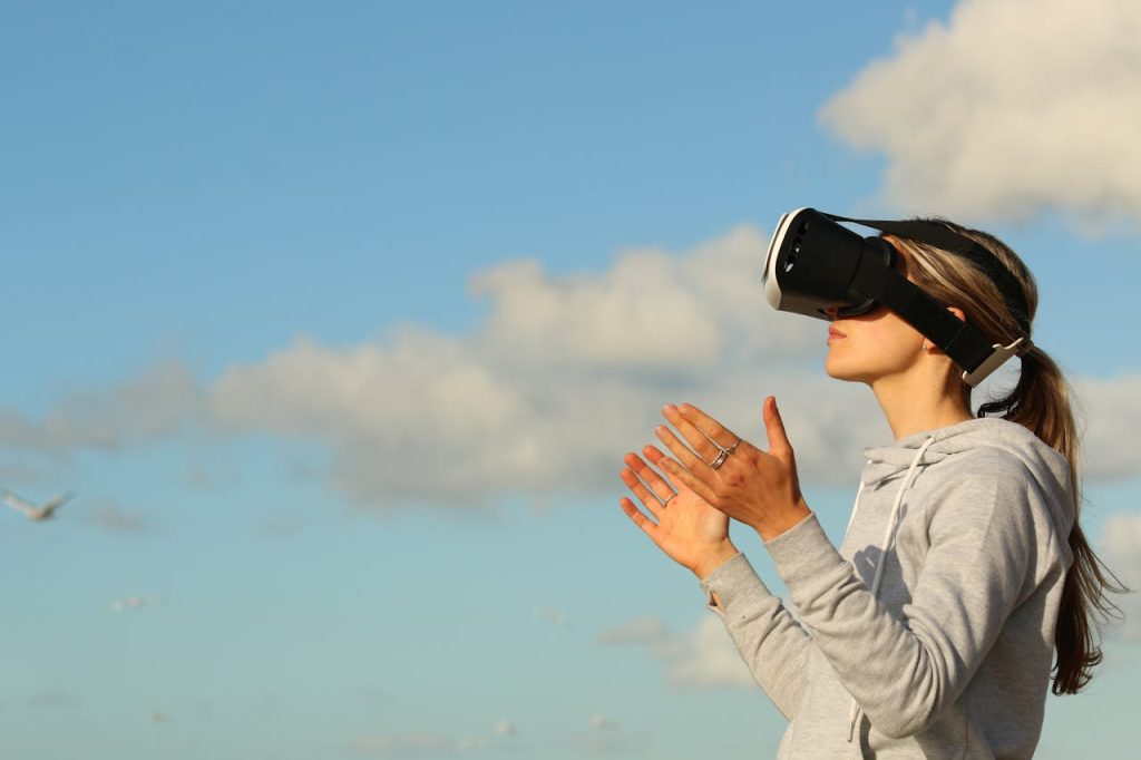 pexels-photo-123335-1 Woman Using Vr Goggles Outdoors