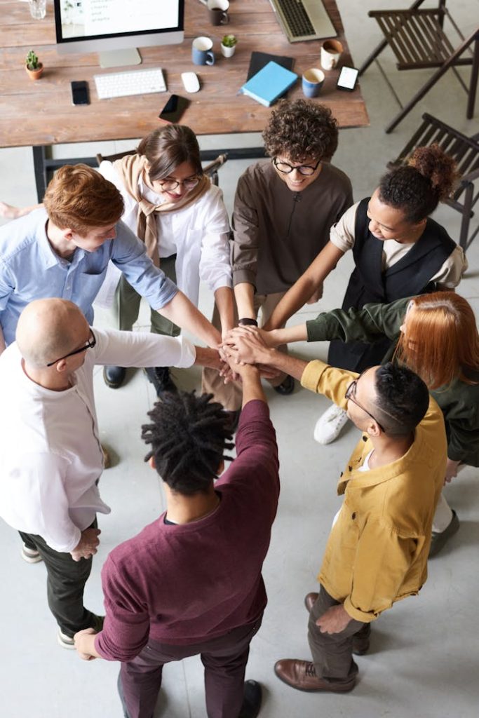 pexels-photo-3184423-1 Photo Of People Holding Each Other's Hands